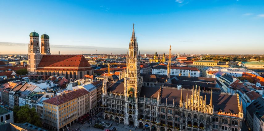 Aerial view of Munich - Marienplatz, Neues Rathaus and Frauenkirche from St. Peter's church on sunset. Munich, Germany